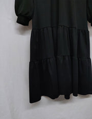 Turtleneck dress with ruffle hem